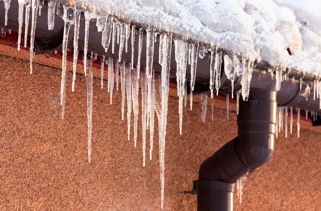 Ice Damage: Why It’s Important to Remove Ice Dams and Icicles from Your Gutters